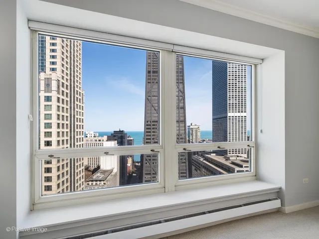 a view of a living room and entry way