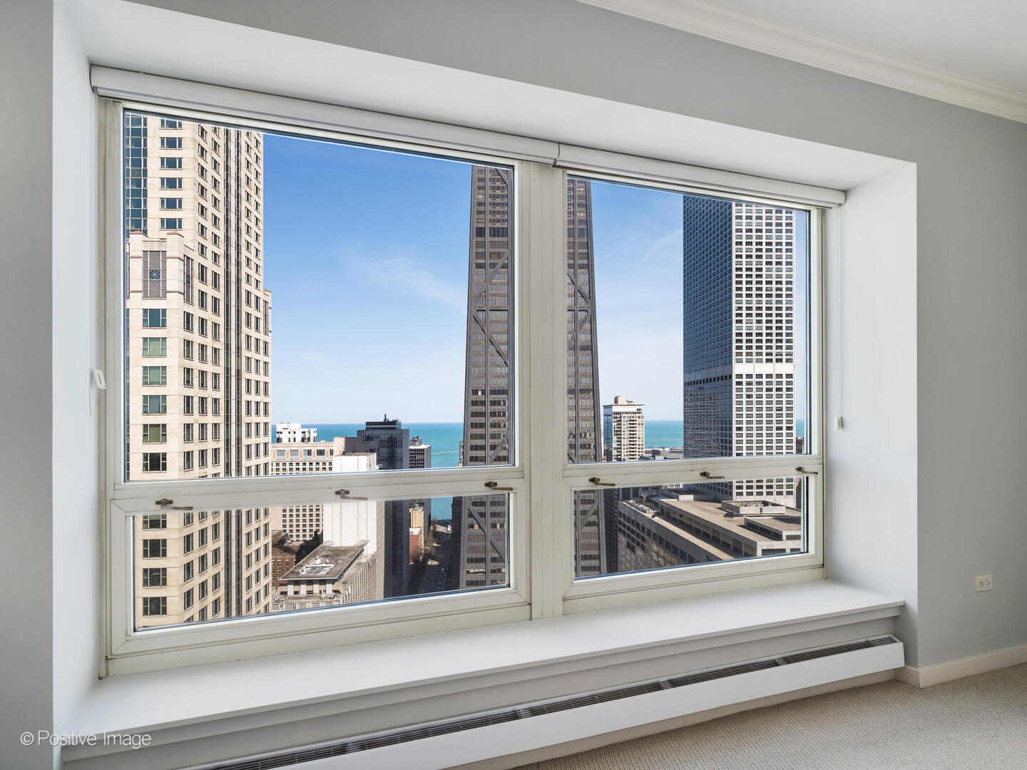 57 East Delaware Place, Unit 3202 Chicago, IL 60611 - Photo 20 of 32 a view of a living room and entry way