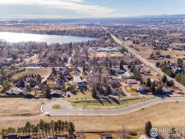 a view of a swimming pool with a balcony