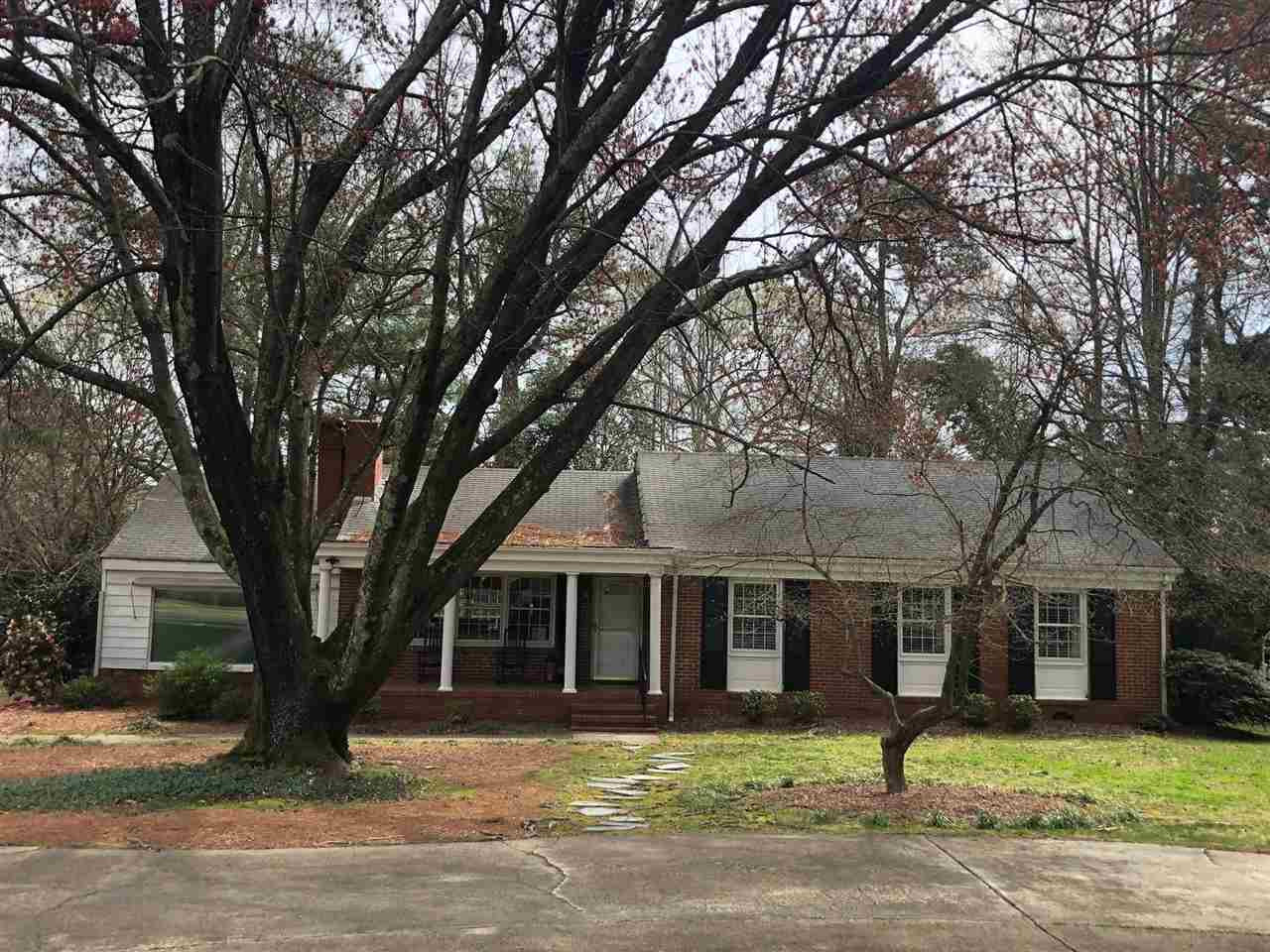 2116 10th Avenue Raleigh, NC 27607 - Photo 1 of 5 front view of a house with a yard