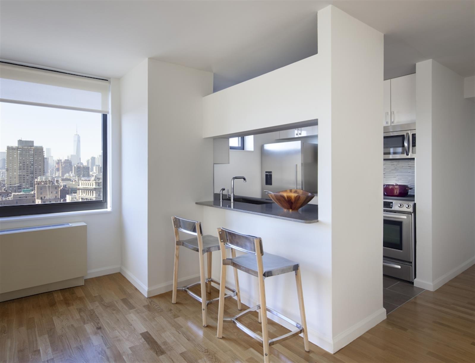 1 Union Square South, Unit 14K Manhattan, NY 10003 - Photo 1 of 4 a dining room with furniture and a floor to ceiling window