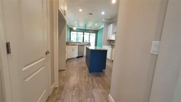 an empty room that has a window in it