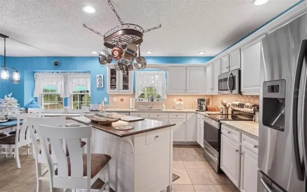 $635,000 | 14204 Highgrove Road, Spring Hill, FL 34609