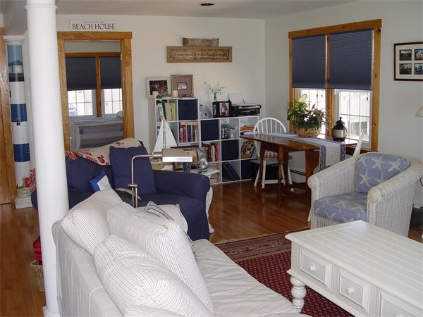 69 Ocean Road North Duxbury, MA 02332 - Photo 12 of 15 a living room with furniture two window and wooden floor