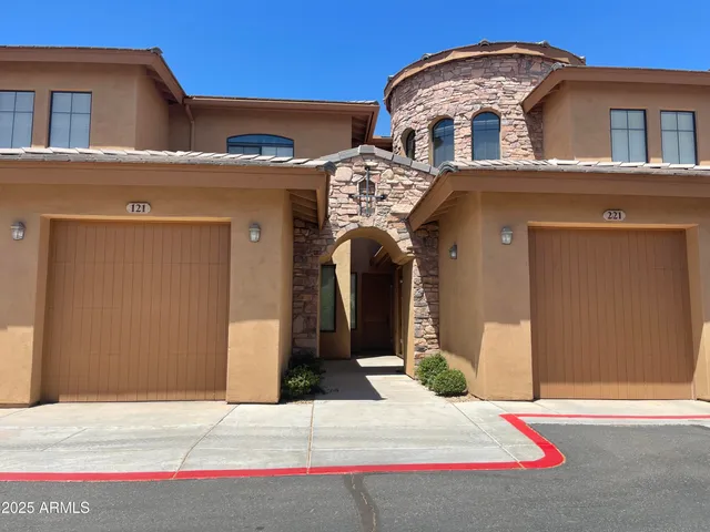 a view of a balcony with plants