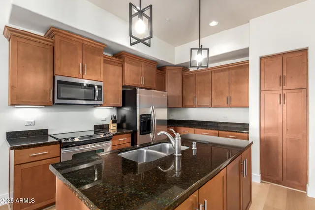 a view of kitchen with wooden floor