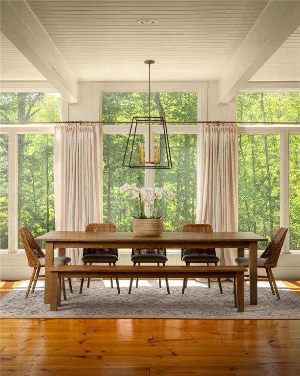 1550 Lackey Road Roswell, GA 30075 - Photo 6 of 92 a view of a dining room with furniture window and wooden floor