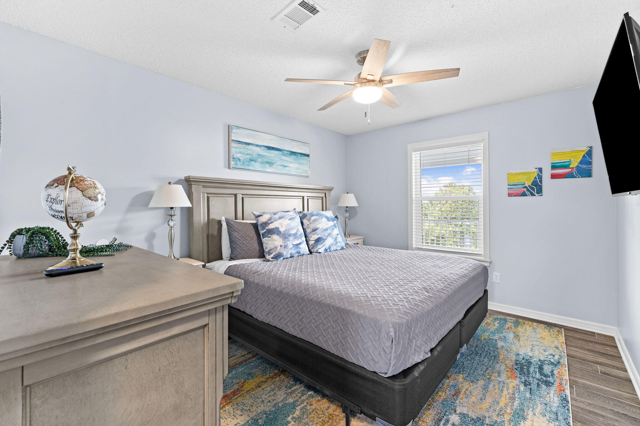 11 Beachside Drive, Unit 1132 Santa Rosa Beach, FL 32459 - Photo 7 of 15 a bedroom with a bed and a chandelier