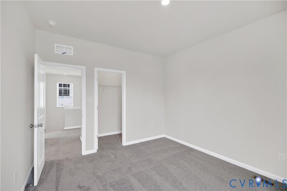 6612 Cassia Loop Moseley, VA 23120 - Photo 11 of 19 a view of an empty room