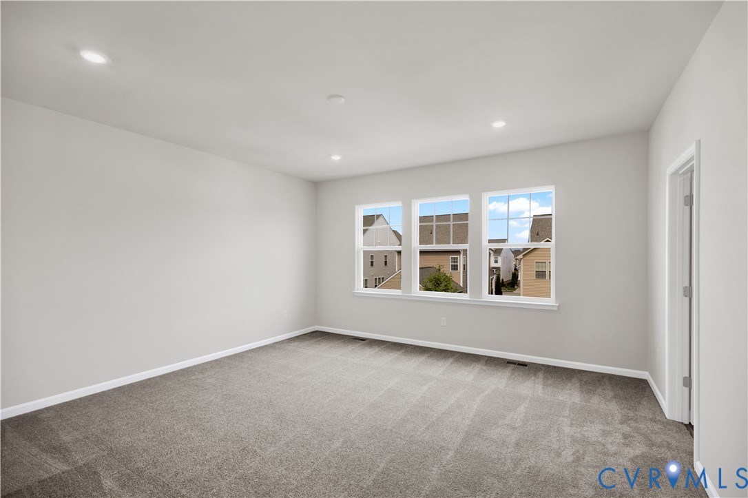 6612 Cassia Loop Moseley, VA 23120 - Photo 12 of 19 an empty room with a window