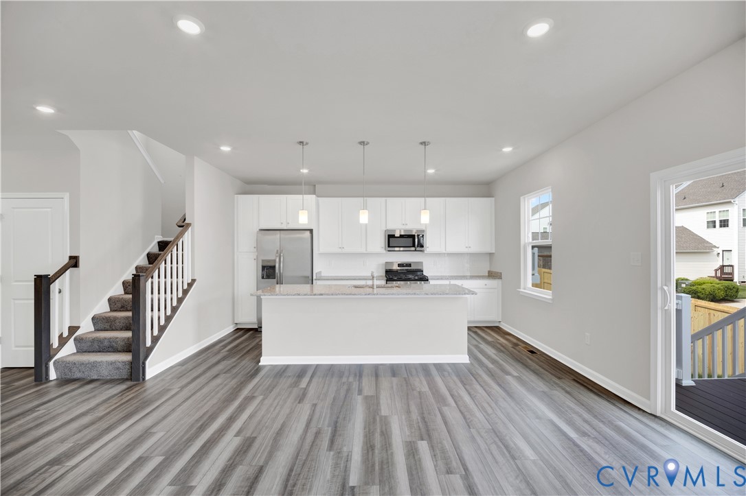 6612 Cassia Loop Moseley, VA 23120 - Photo 3 of 19 a view of kitchen with sink and wooden floor