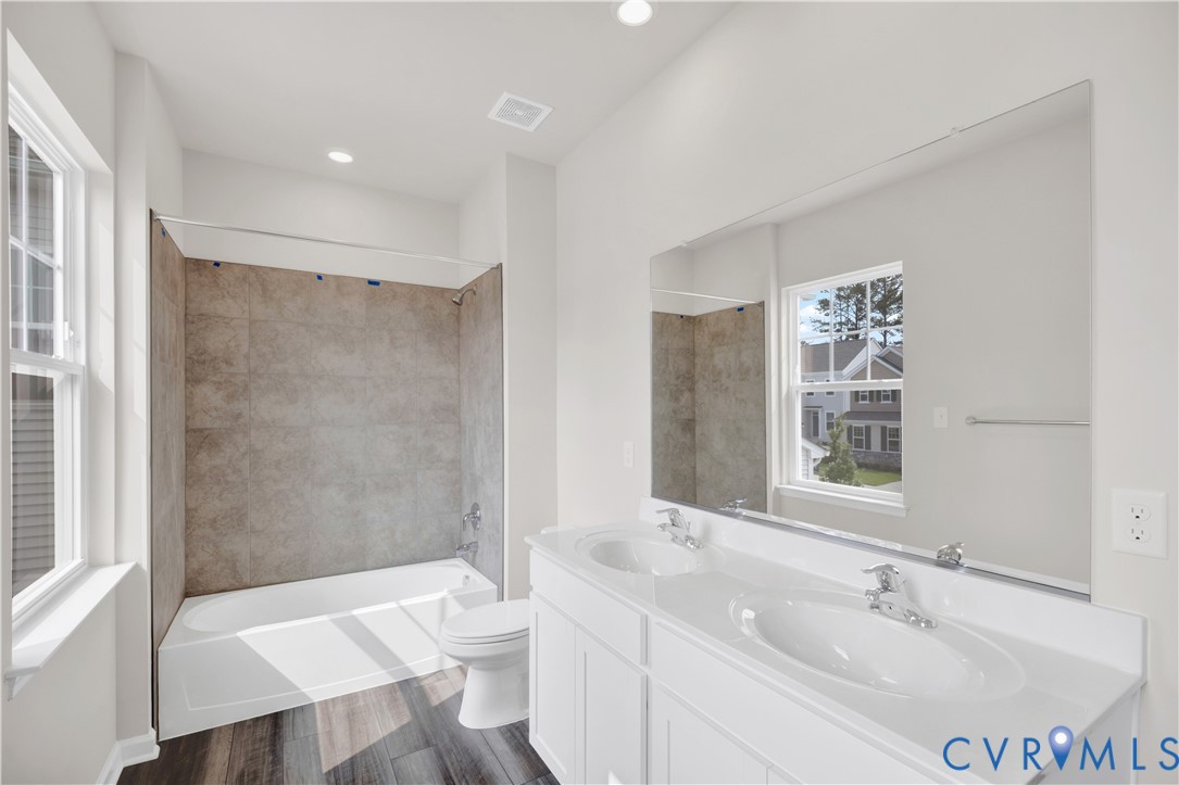 6612 Cassia Loop Moseley, VA 23120 - Photo 8 of 19 a bathroom with a sink toilet and shower