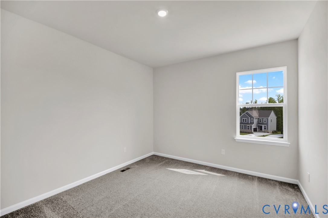 6612 Cassia Loop Moseley, VA 23120 - Photo 10 of 19 an empty room with a window