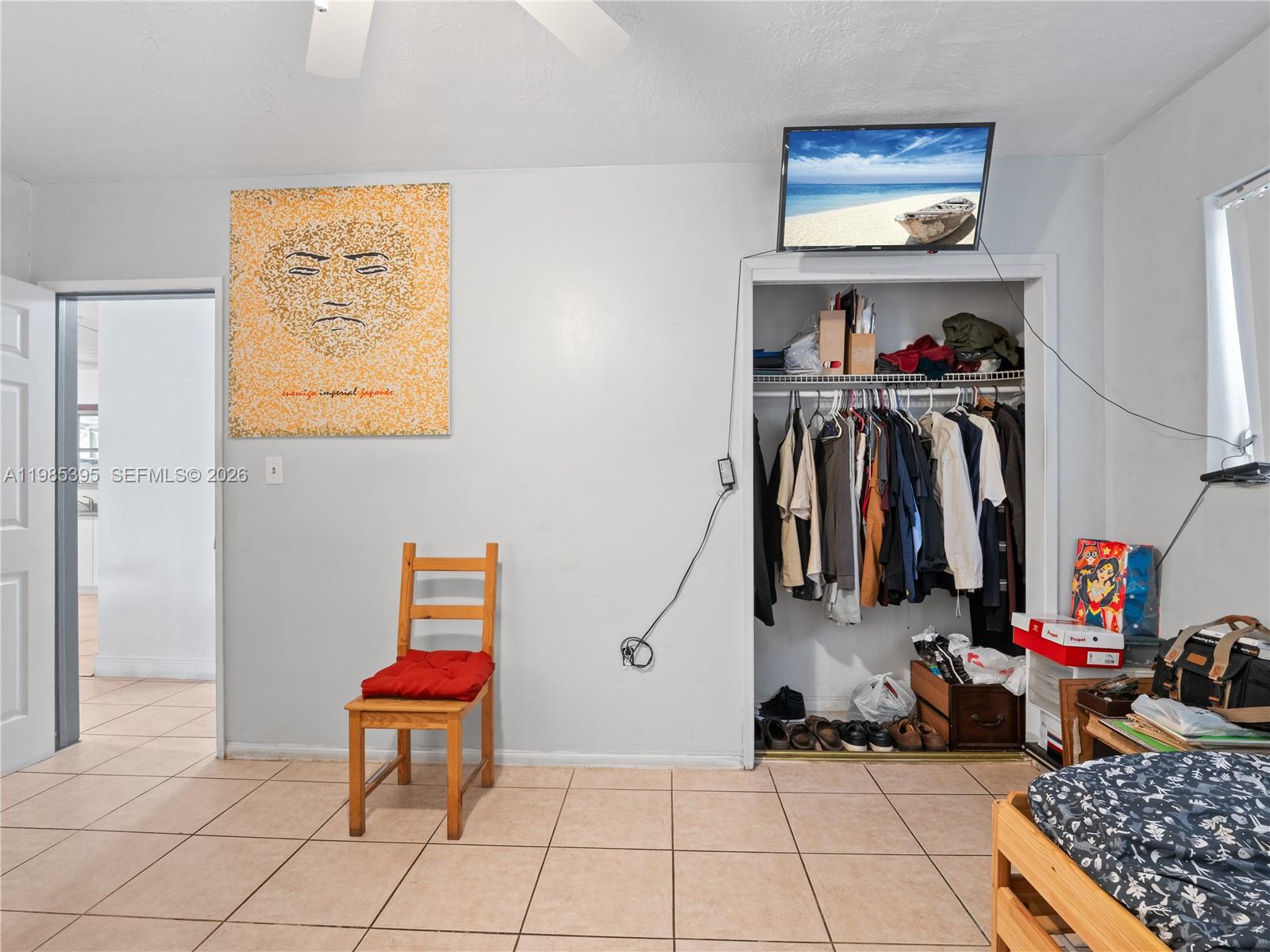 6111 Southwest 20th Court Miramar, FL 33023 - Photo 16 of 31 a room with gym equipment and a walk in closet