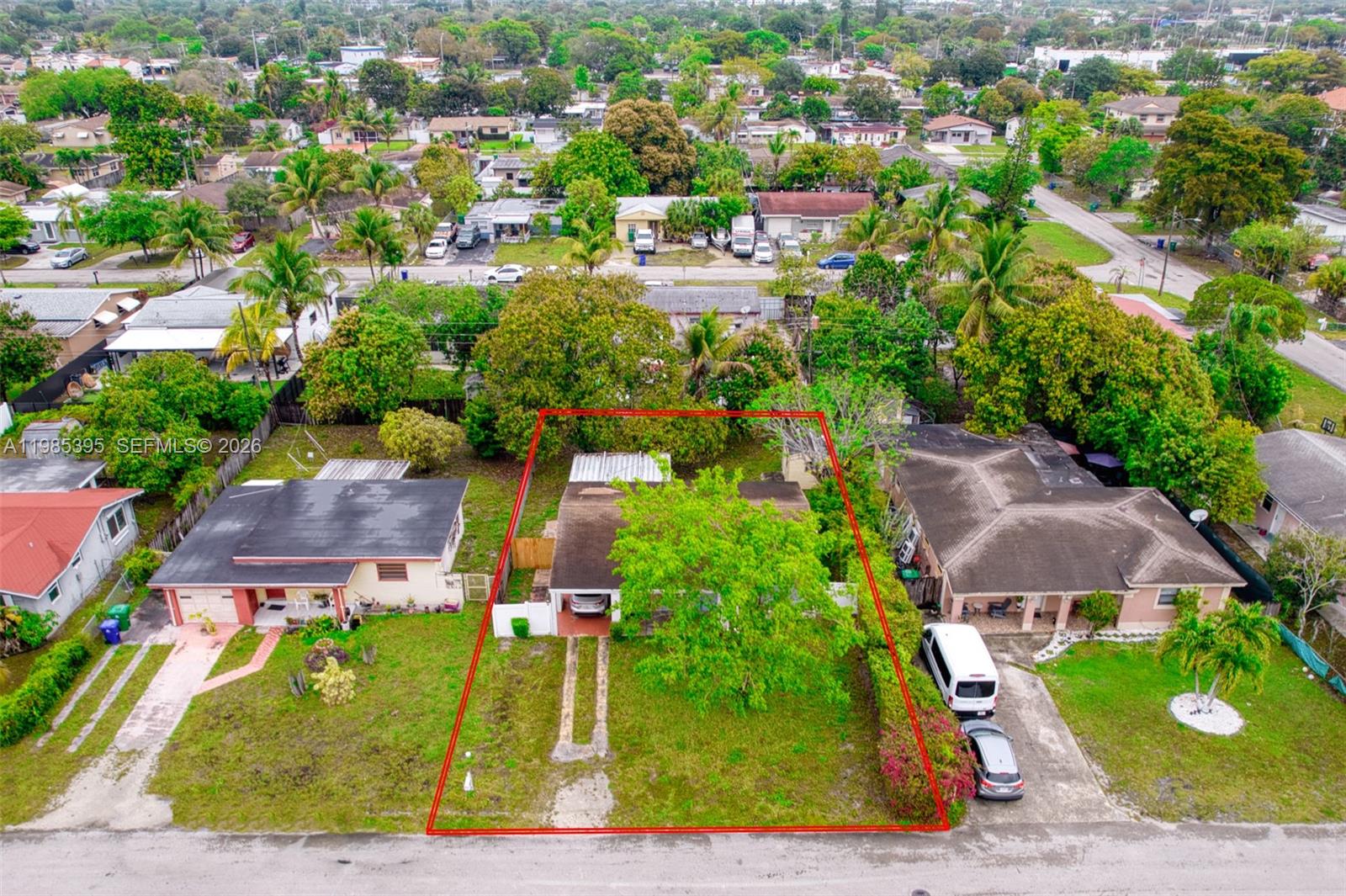 6111 Southwest 20th Court Miramar, FL 33023 - Photo 2 of 31 an aerial view of residential houses with outdoor space and street view