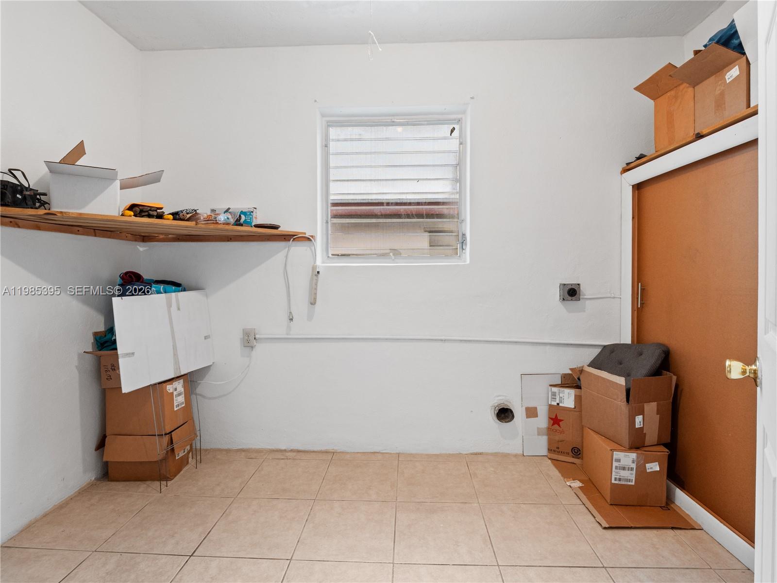 6111 Southwest 20th Court Miramar, FL 33023 - Photo 21 of 31 a utility room with dryer and washer