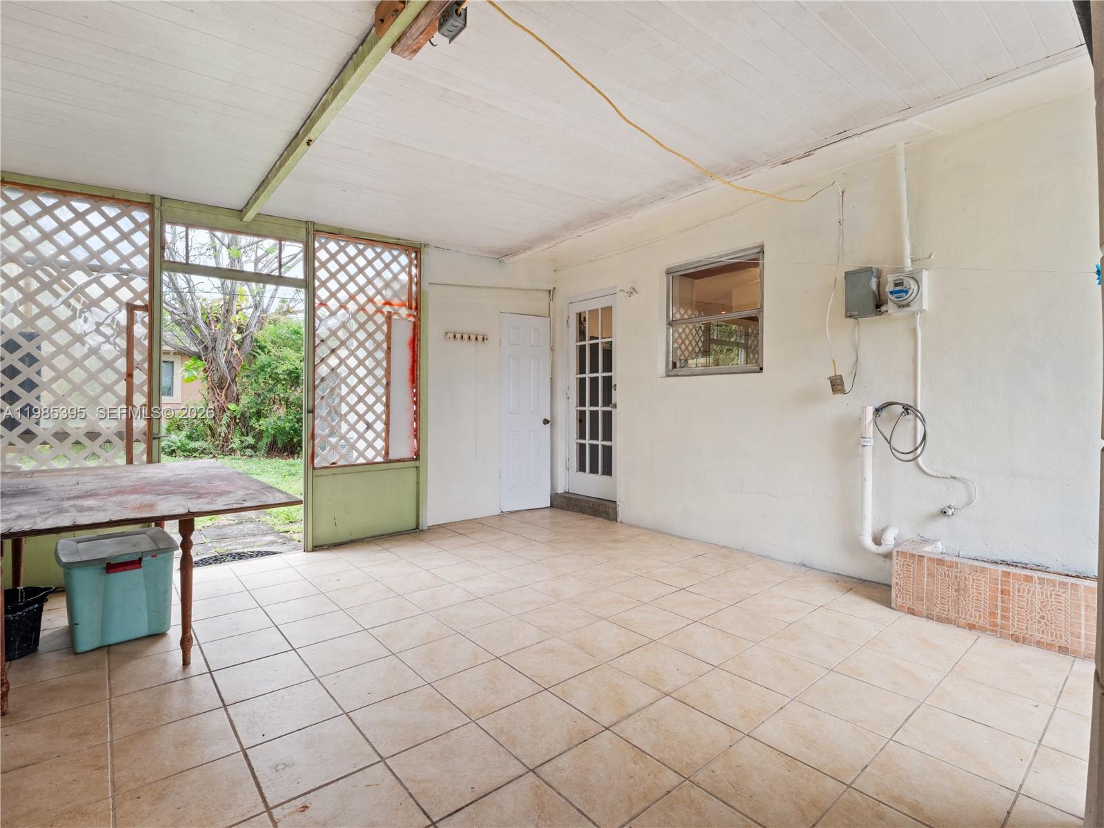 6111 Southwest 20th Court Miramar, FL 33023 - Photo 23 of 31 a view of a room with window