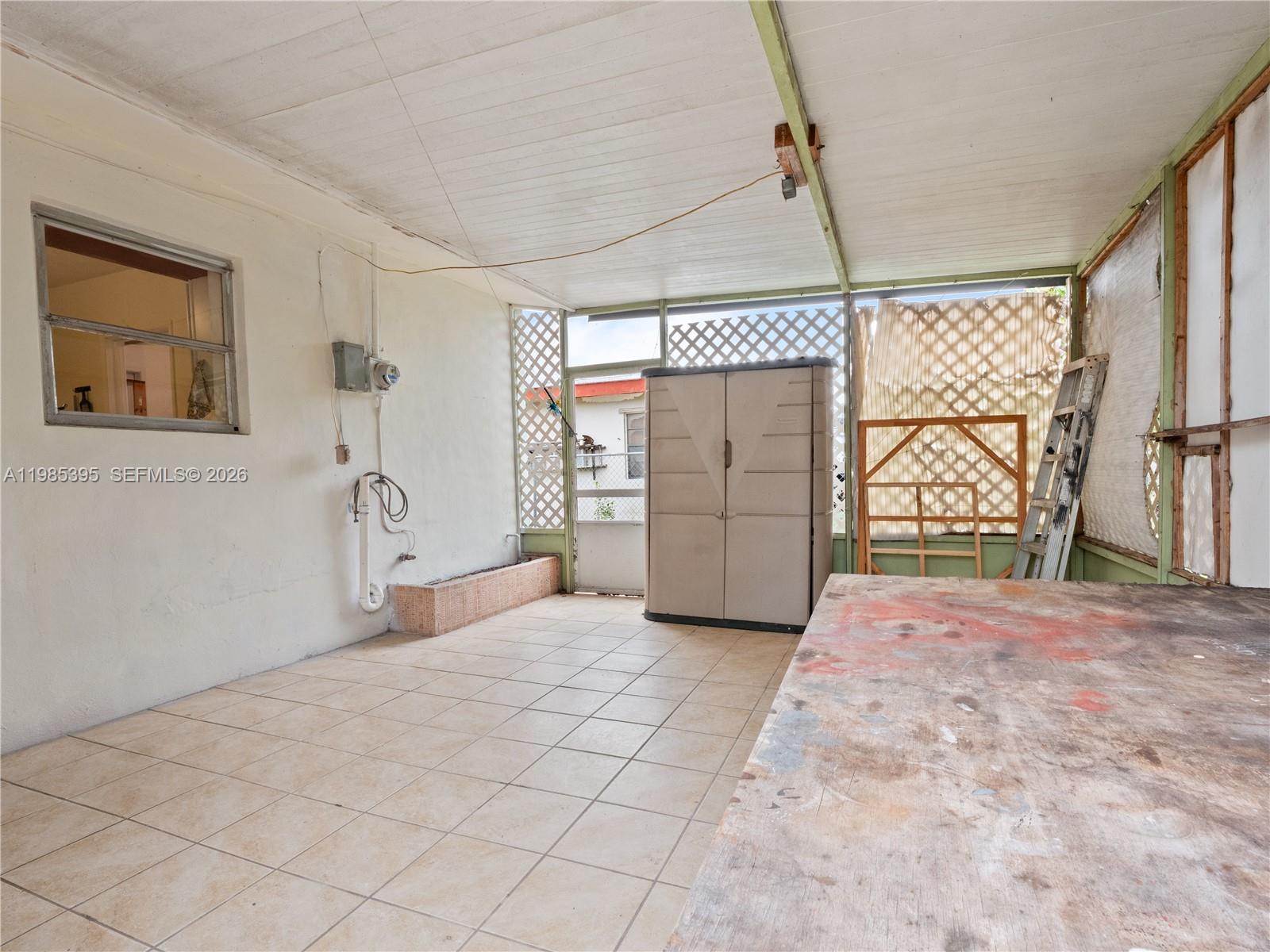 6111 Southwest 20th Court Miramar, FL 33023 - Photo 24 of 31 a view of a room with a large window