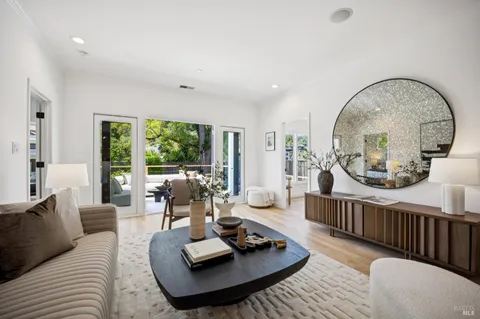 a living room with furniture and a table