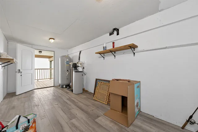 a view of a storage & utility room with closet