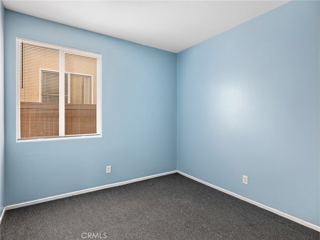 14400 Jeremiah Street Adelanto, CA 92301 - Photo 18 of 45 an empty room with a window