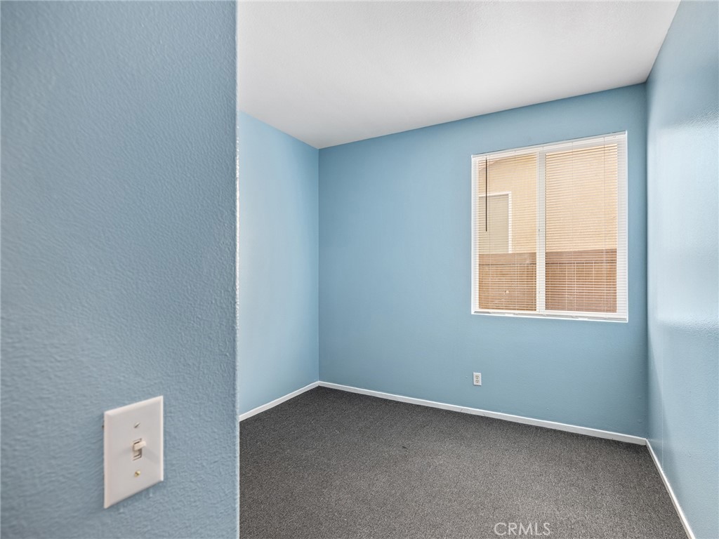 14400 Jeremiah Street Adelanto, CA 92301 - Photo 20 of 45 an empty room with a window