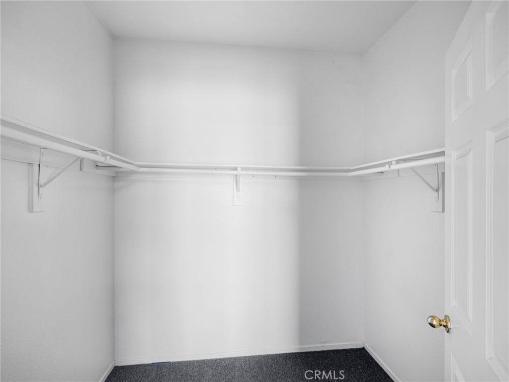 14400 Jeremiah Street Adelanto, CA 92301 - Photo 28 of 45 a view of an empty walk in closet