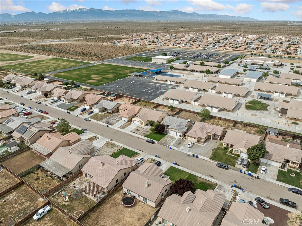 14400 Jeremiah Street Adelanto, CA 92301 - Photo 44 of 45 an aerial view of residential building and ocean