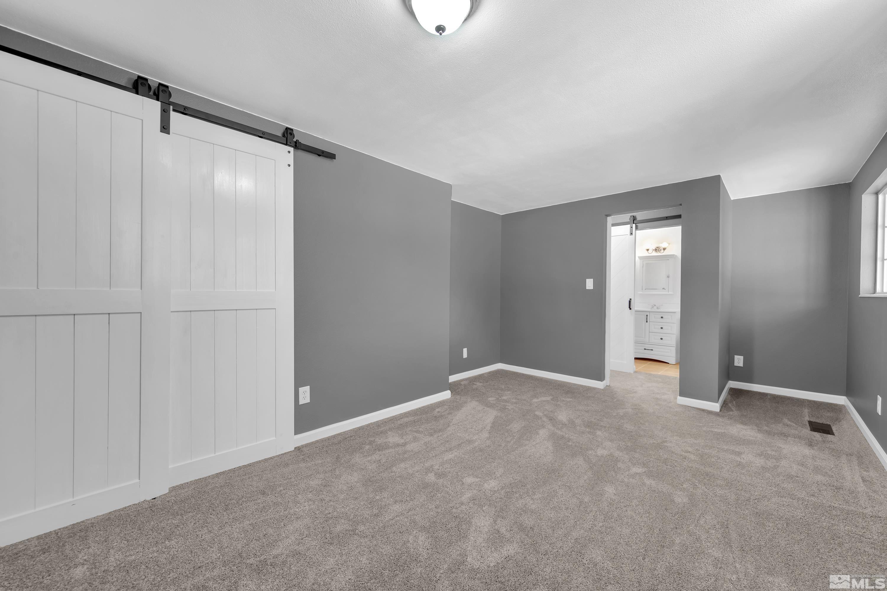 635 Wiggins Court Reno, NV 89506 - Photo 13 of 20 a view of an empty room with closet area