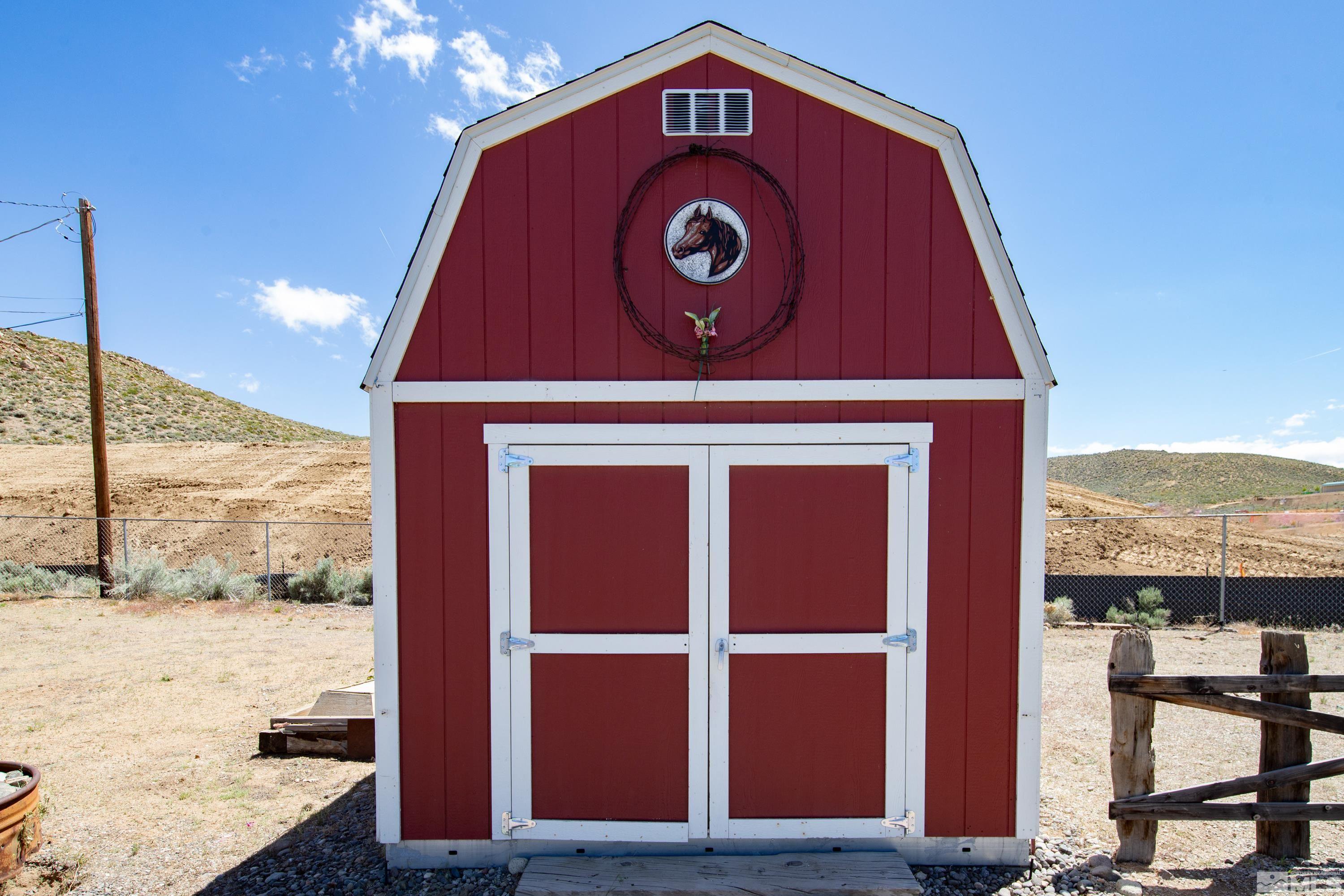 635 Wiggins Court Reno, NV 89506 - Photo 16 of 20 a front view of a house with a yard