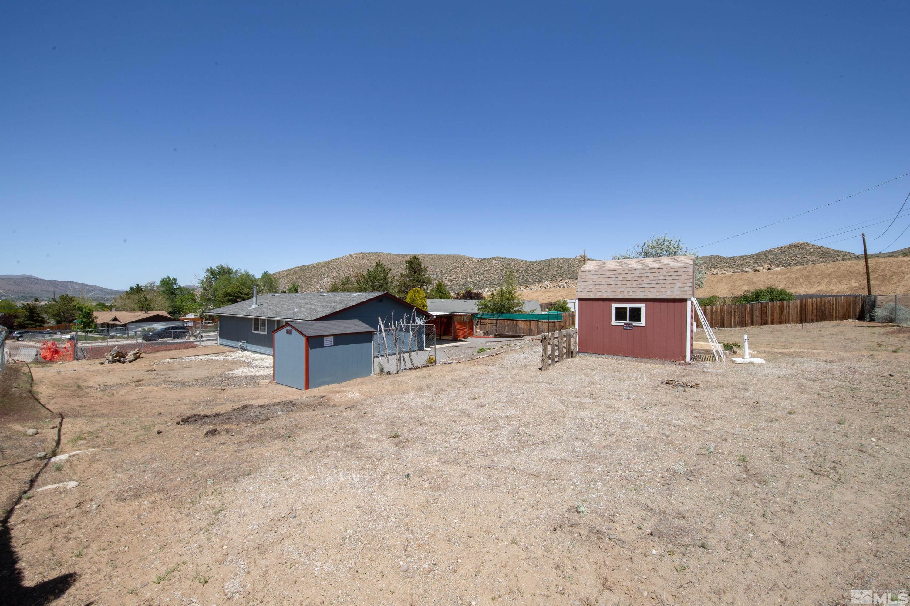 635 Wiggins Court Reno, NV 89506 - Photo 17 of 20 a view of a terrace with a table and chairs