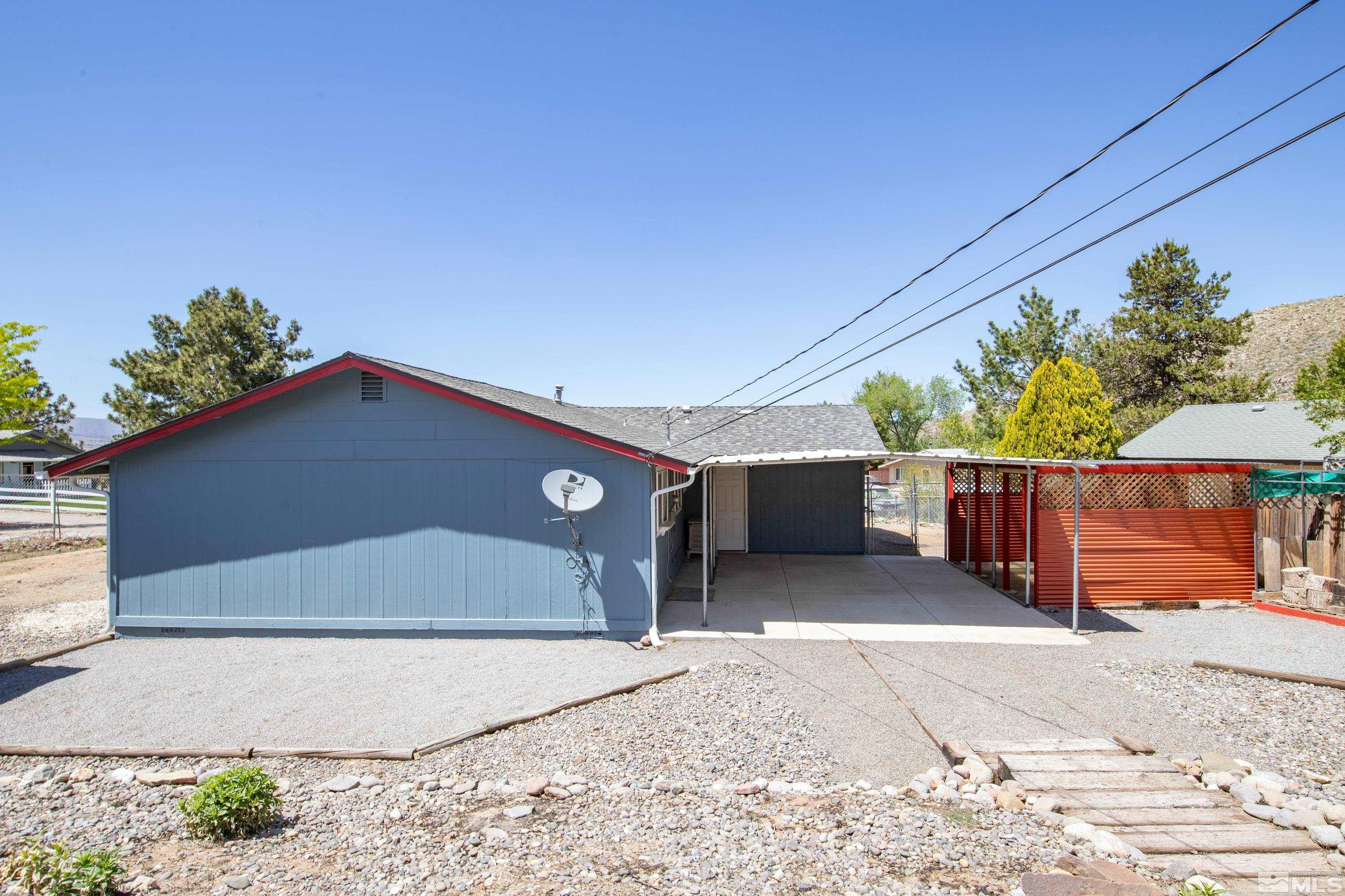 635 Wiggins Court Reno, NV 89506 - Photo 18 of 20 a front view of a house with a yard