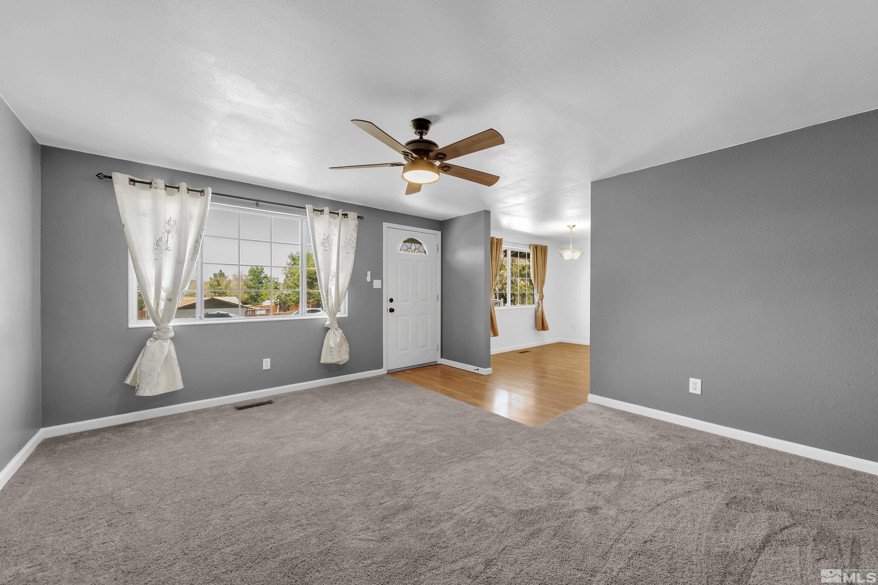 635 Wiggins Court Reno, NV 89506 - Photo 3 of 20 a view of an empty room with a window