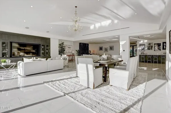 a large kitchen with stainless steel appliances lots of counter space sink and cabinets