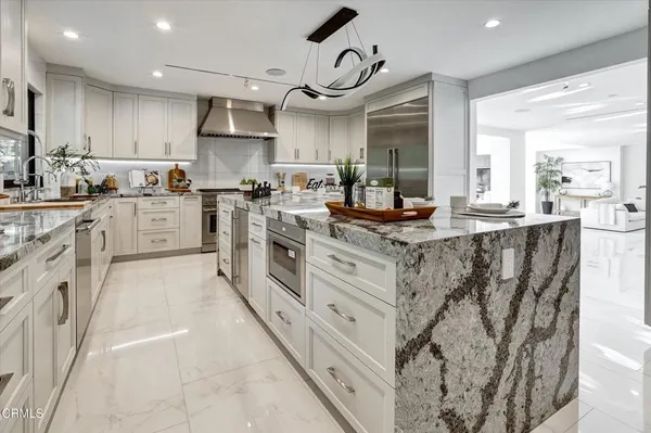a view of kitchen and washer and dryer