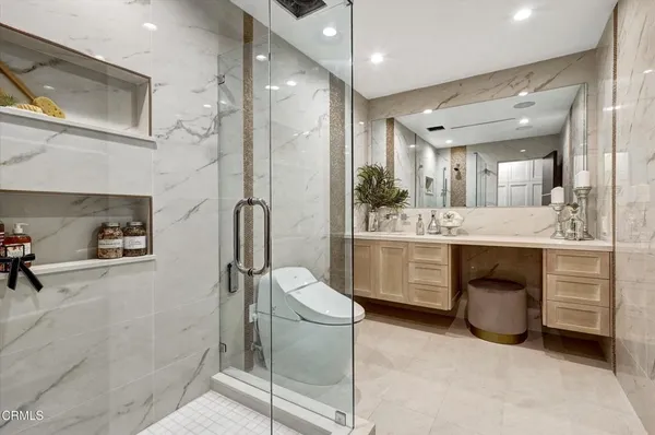 a view of a dining hall with large windows