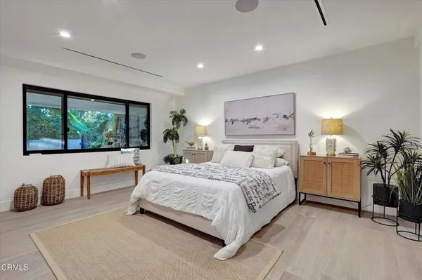 a view of swimming pool from a balcony