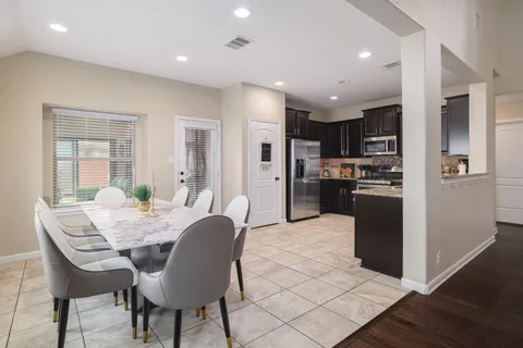 a view of a dining room with furniture