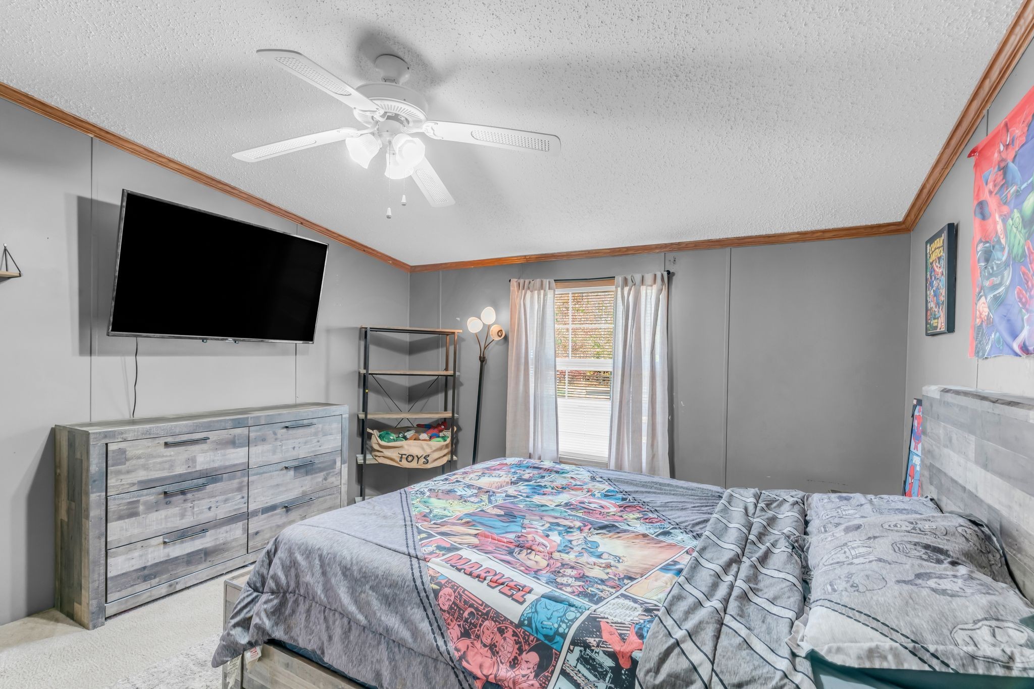 2309 West Mt Vernon Road Bethpage, TN 37022 - Photo 22 of 33 a bedroom with a bed and a flat screen tv in it