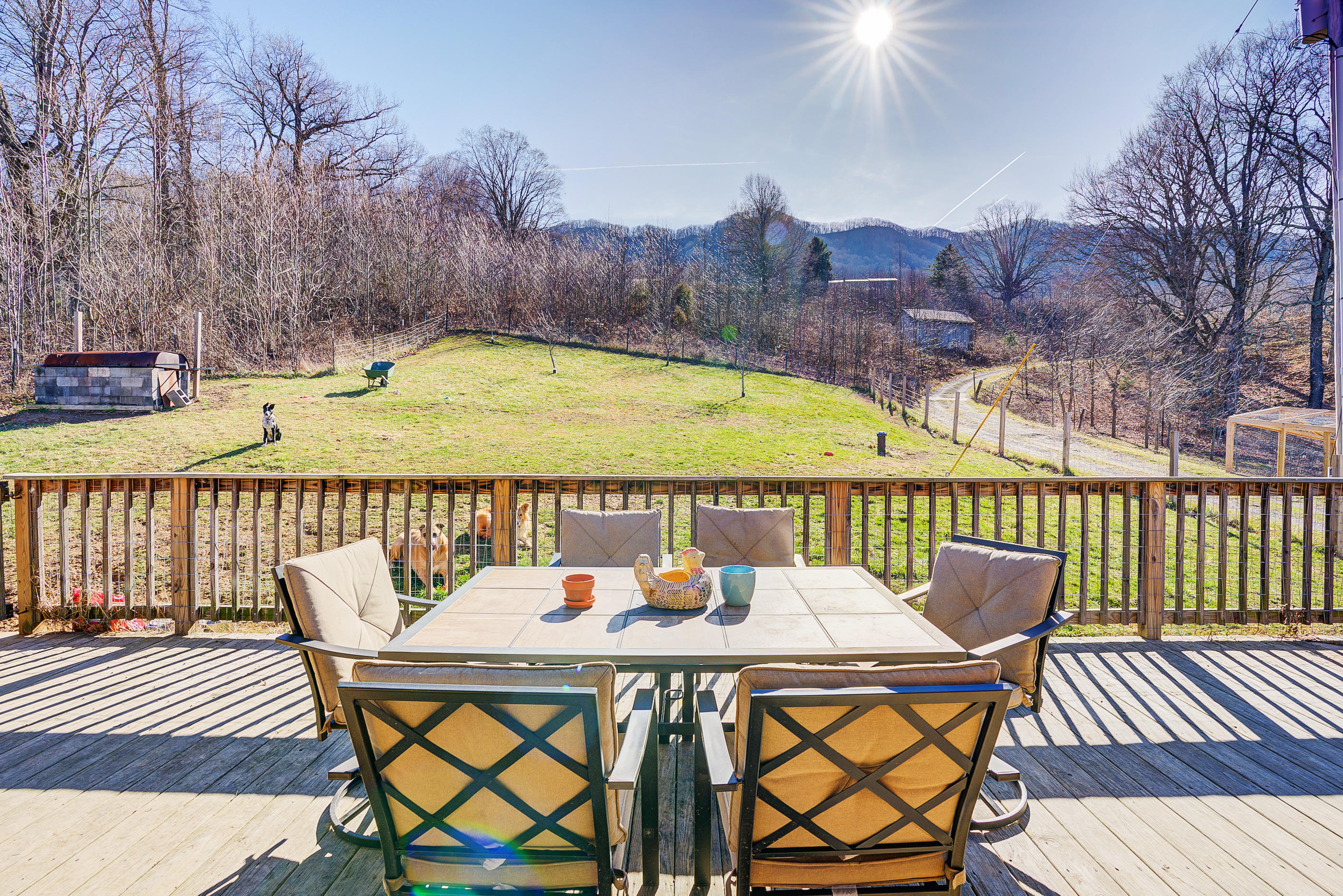 5076 Green Valley Road Lebanon, VA 24266 - Photo 3 of 57 a view of a chairs and table on the roof deck