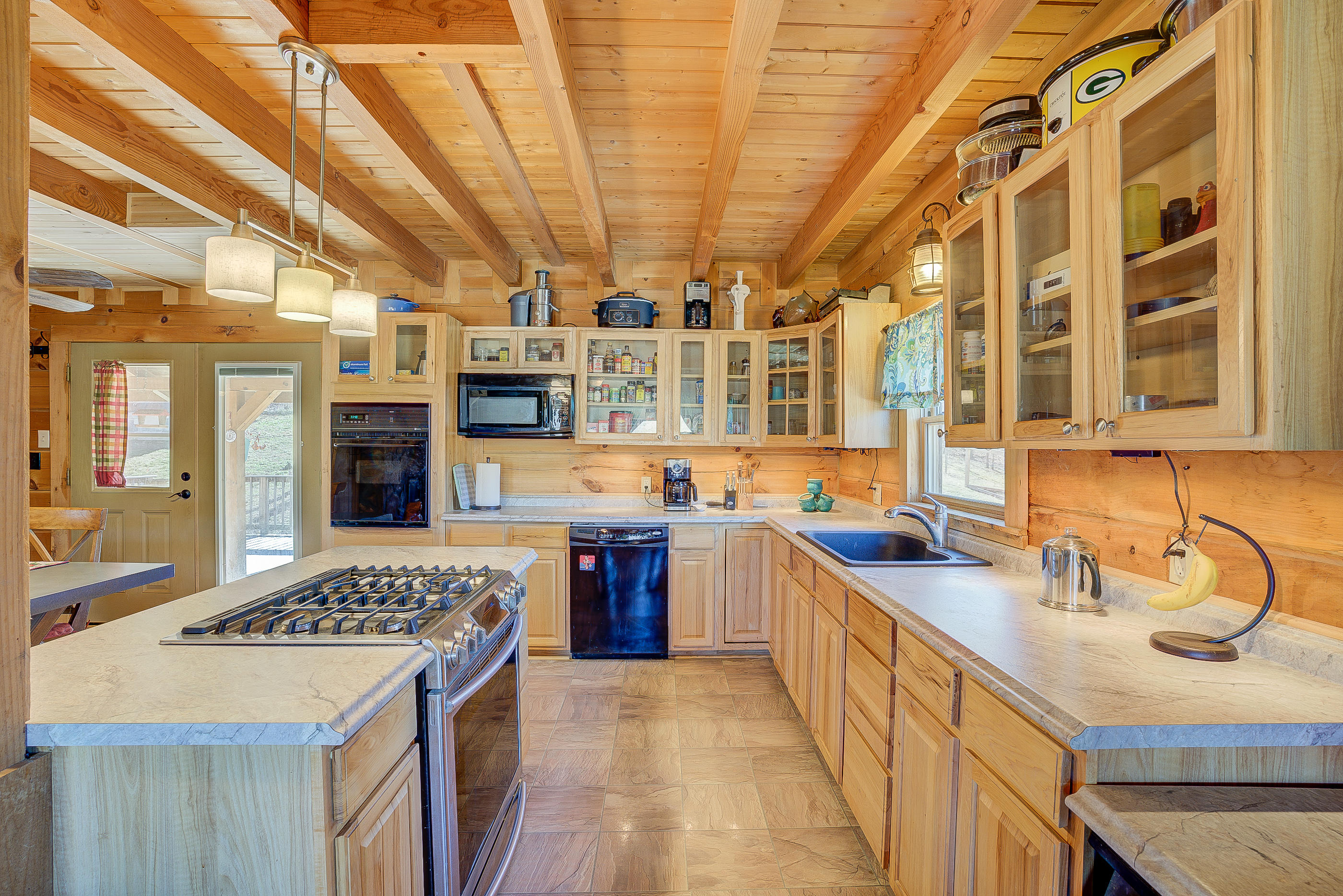 5076 Green Valley Road Lebanon, VA 24266 - Photo 9 of 57 a kitchen that has a lot of cabinets in it