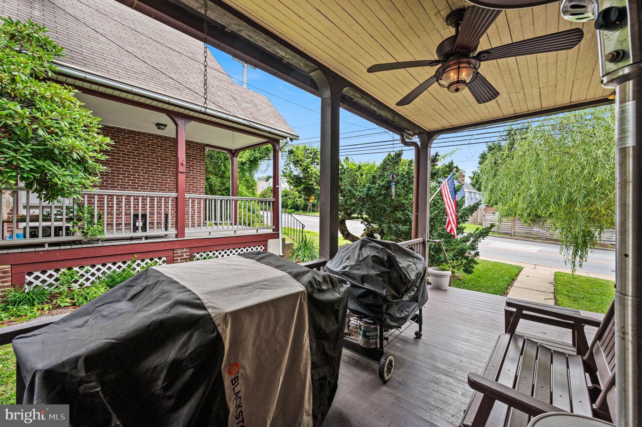 3 Township Line Road Elkins Park, PA 19027 - Photo 6 of 40 Charming porch with lush greenery.