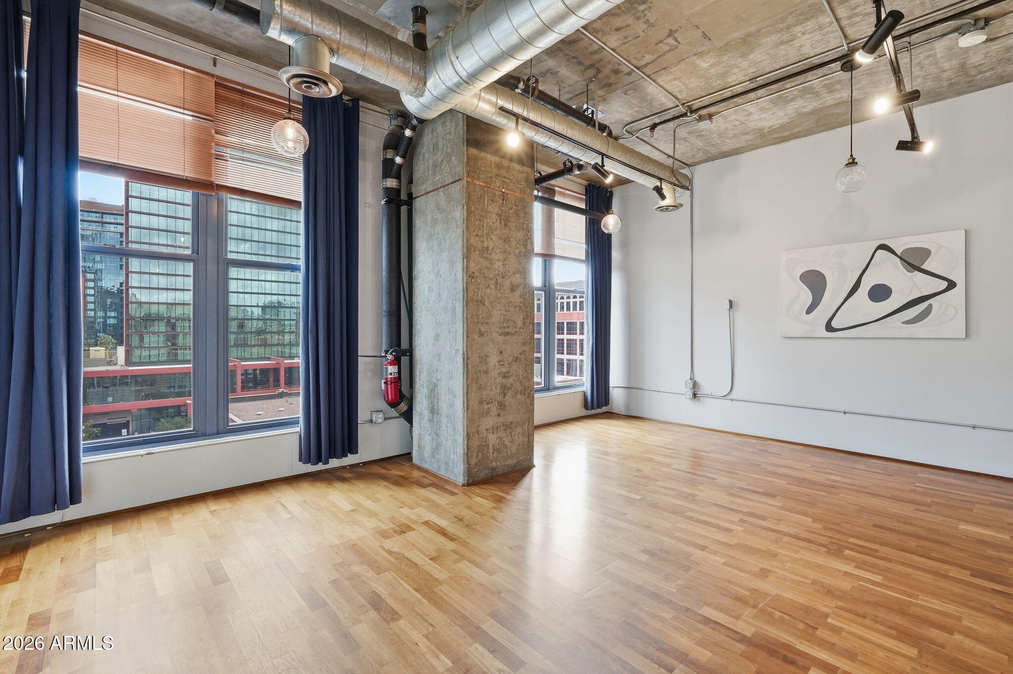 21 East 6th Street, Unit 608 Tempe, AZ 85281 - Photo 5 of 25 a view of an empty room with a window