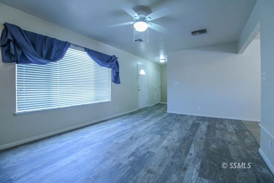 1043 Peg Street Ridgecrest, CA 93555 - Photo 5 of 45 a view of an empty room with a window