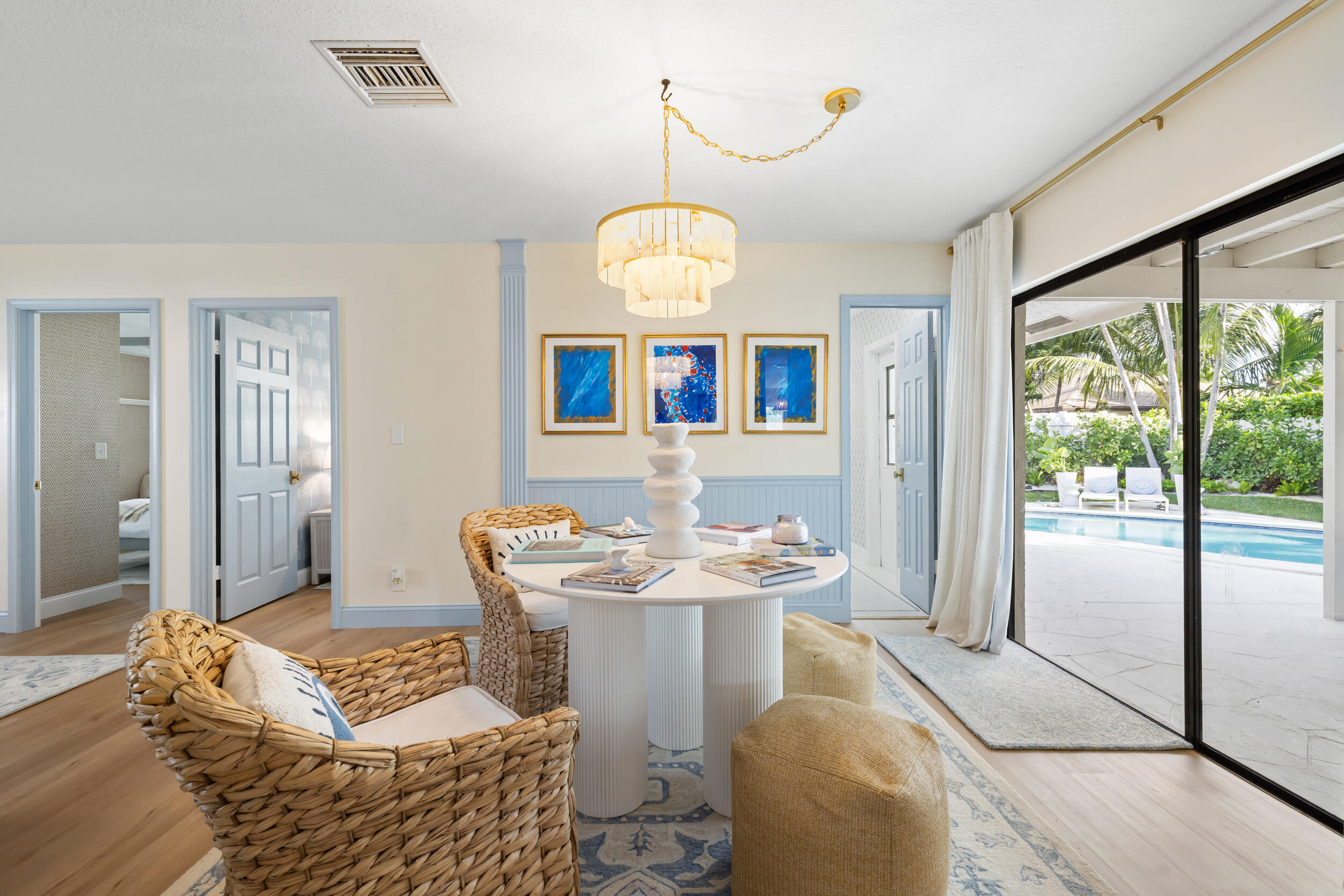 2512 Southwest 5th Street Boynton Beach, FL 33435 - Photo 11 of 37 a living room with furniture and a large mirror