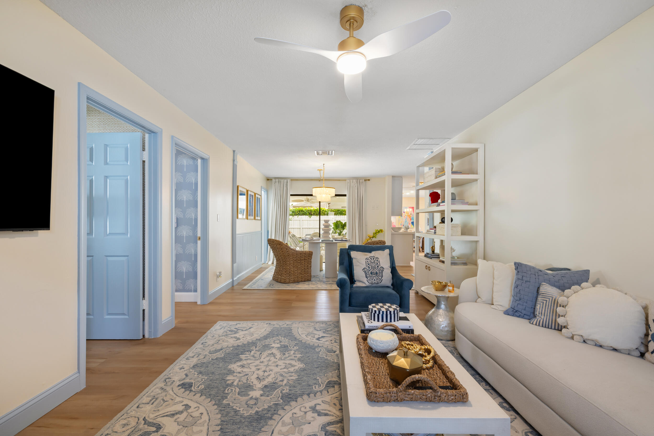 2512 Southwest 5th Street Boynton Beach, FL 33435 - Photo 14 of 37 a living room with furniture and a flat screen tv