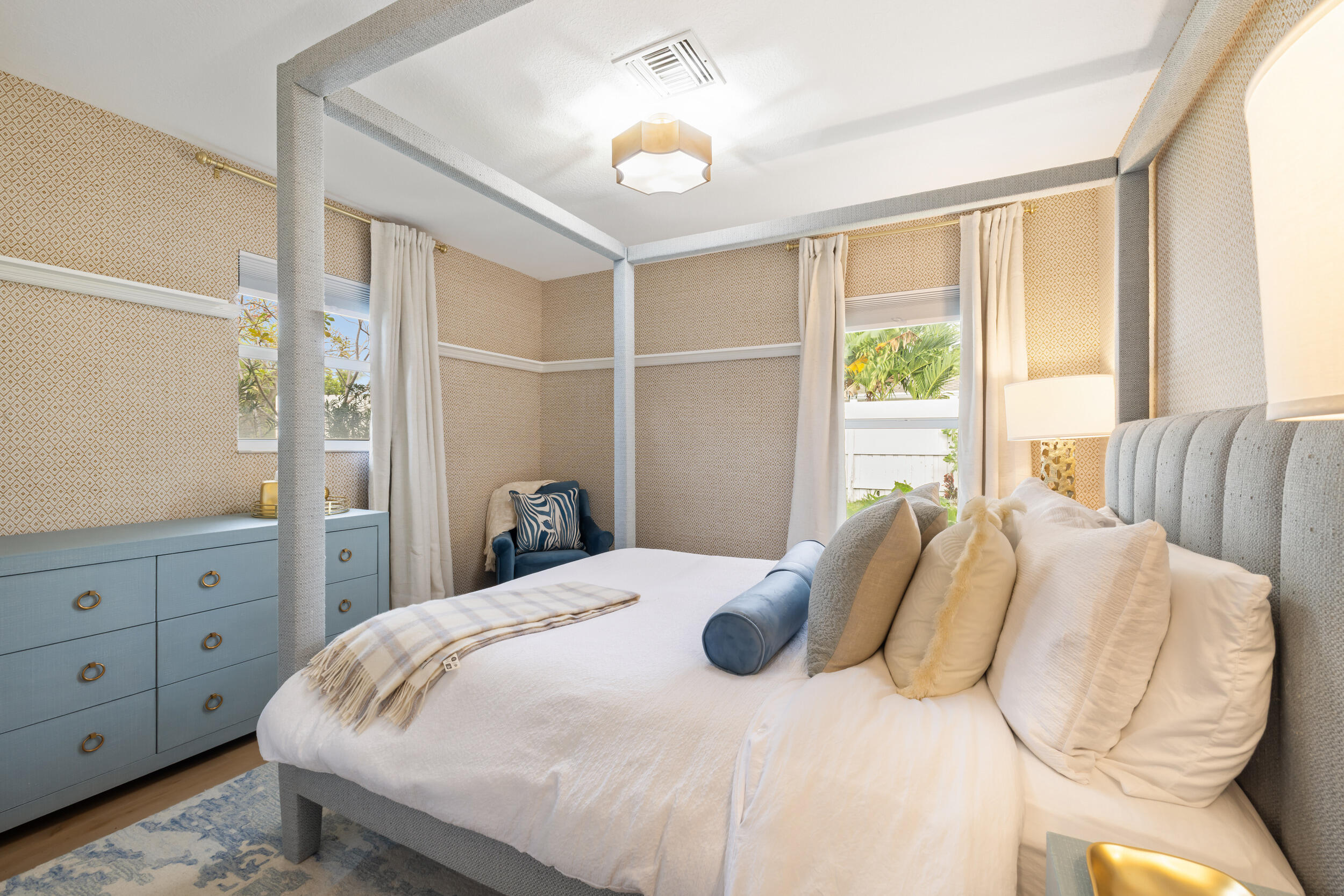 2512 Southwest 5th Street Boynton Beach, FL 33435 - Photo 19 of 37 a bedroom with a bed and a dresser