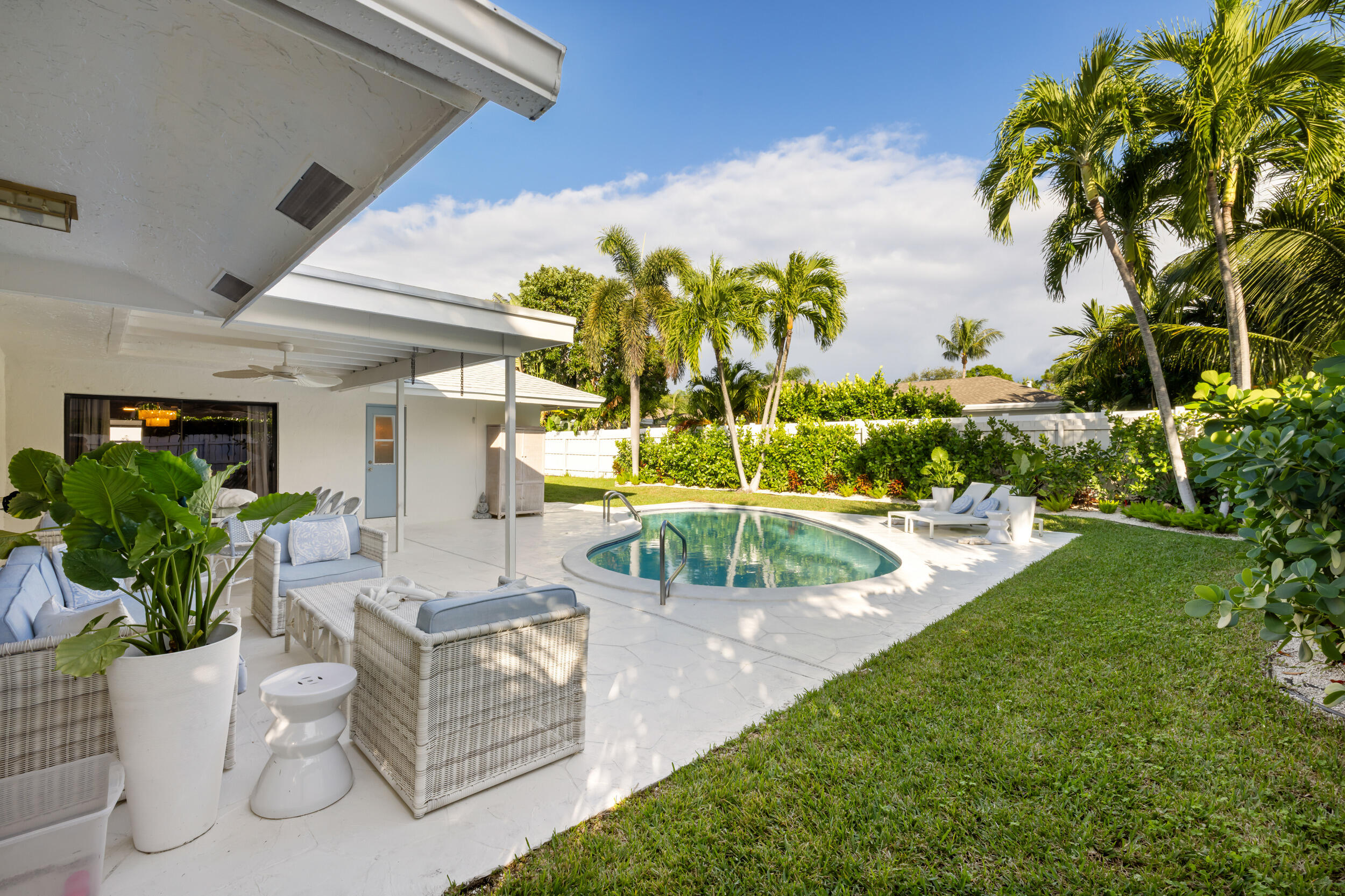 2512 Southwest 5th Street Boynton Beach, FL 33435 - Photo 24 of 37 a view of a swimming pool with a patio