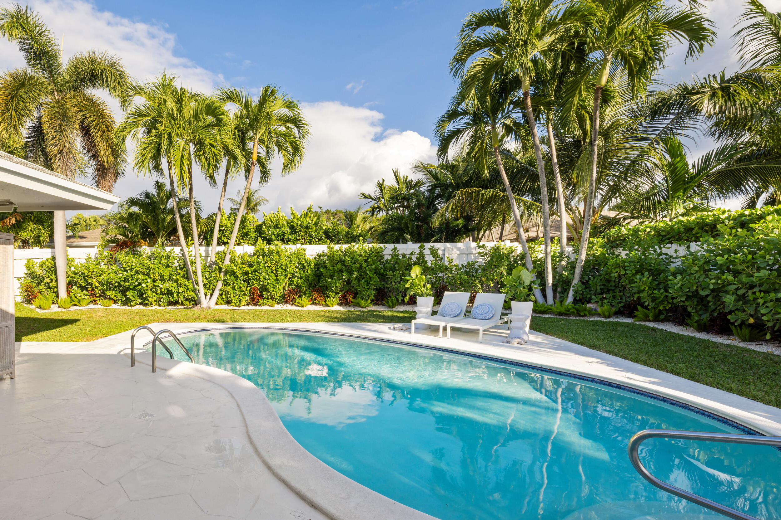 2512 Southwest 5th Street Boynton Beach, FL 33435 - Photo 26 of 37 a view of a swimming pool with a yard