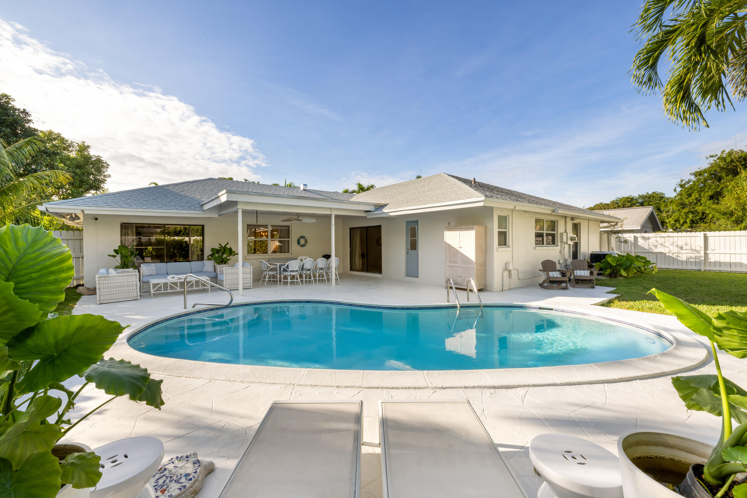 2512 Southwest 5th Street Boynton Beach, FL 33435 - Photo 27 of 37 a view of a house with swimming pool